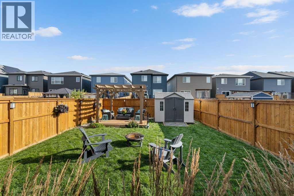Single Family House for Sale in  Belmont Crescent SW Belmont Calgary 