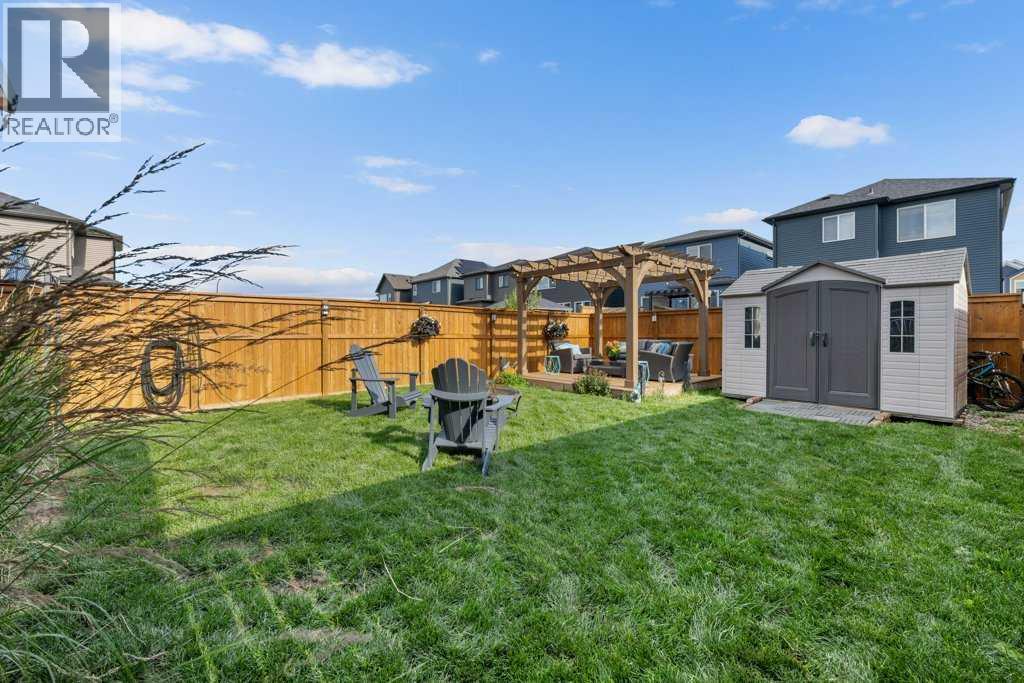 Single Family House for Sale in  Belmont Crescent SW Belmont Calgary 
