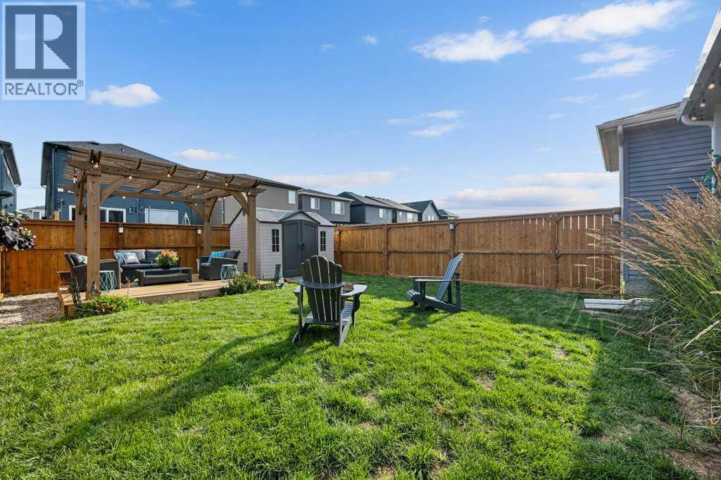 Single Family House for Sale in  Belmont Crescent SW Belmont Calgary 