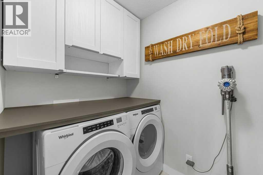 Single Family House for Sale in  Belmont Crescent SW Belmont Calgary 