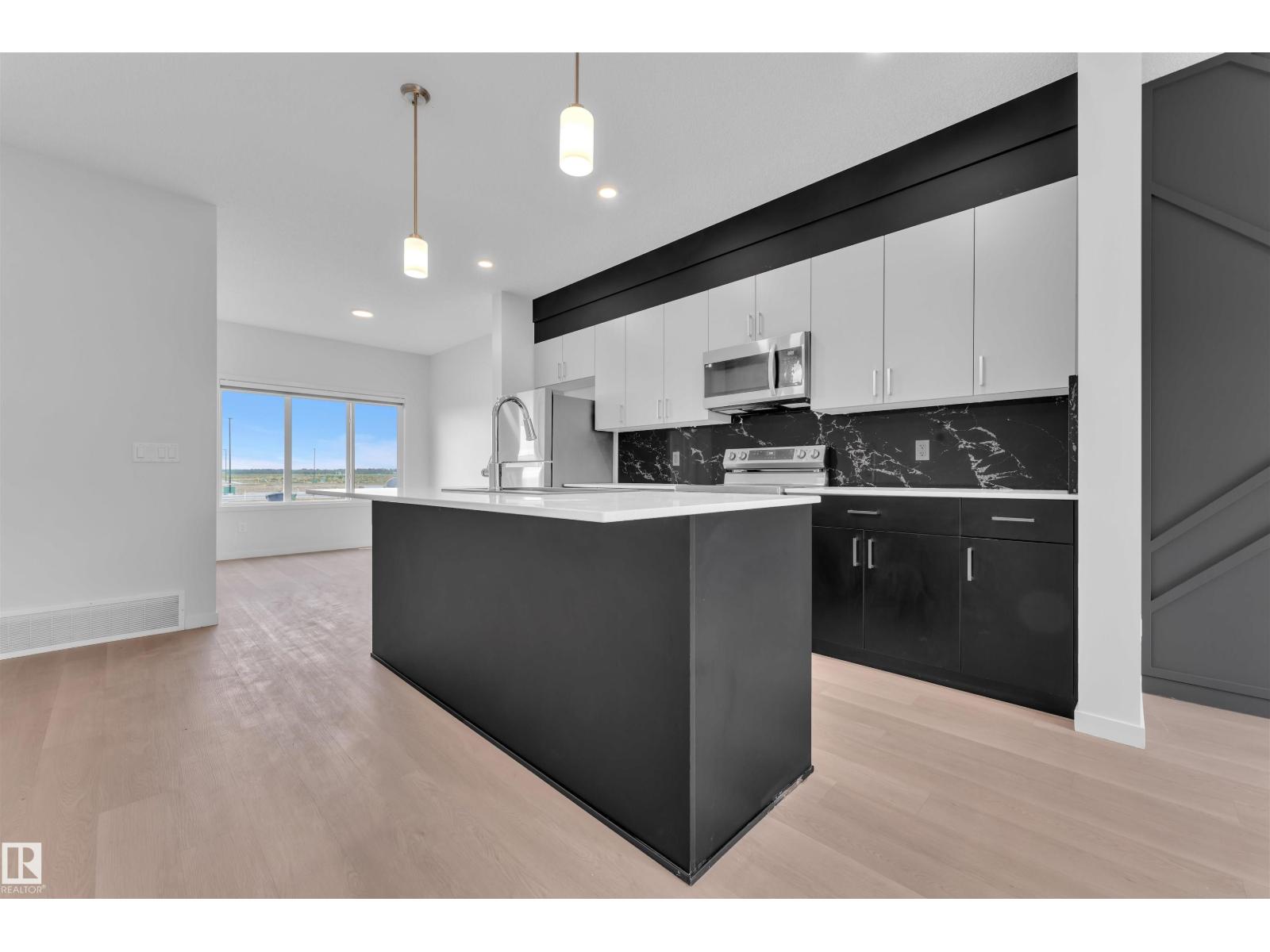 Photo 11 of 7129 46 A St, Beaumont AB