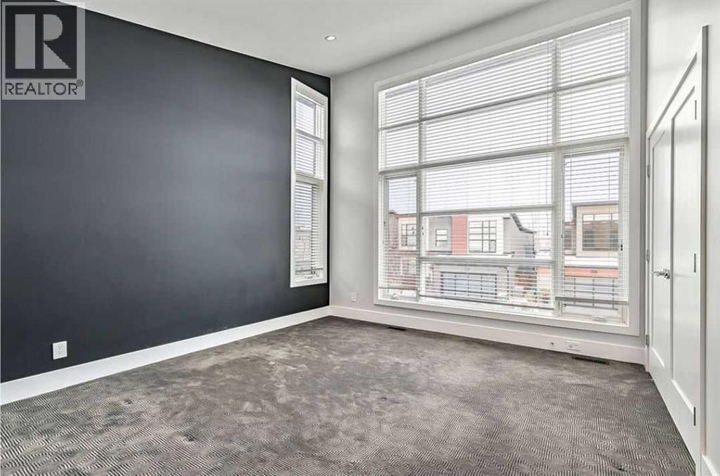 Single Family House for Sale in  West Point Mews SW West Springs Calgary 