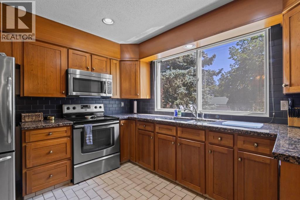 Single Family House for Sale in  Canata Close SW Canyon Meadows Calgary 