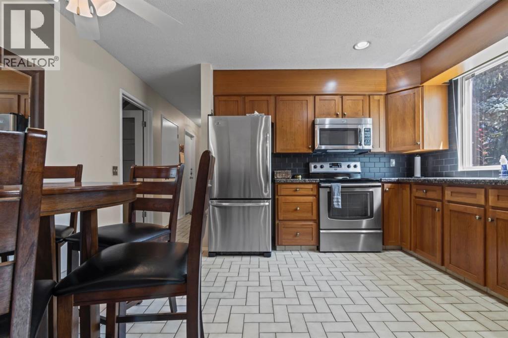 Single Family House for Sale in  Canata Close SW Canyon Meadows Calgary 