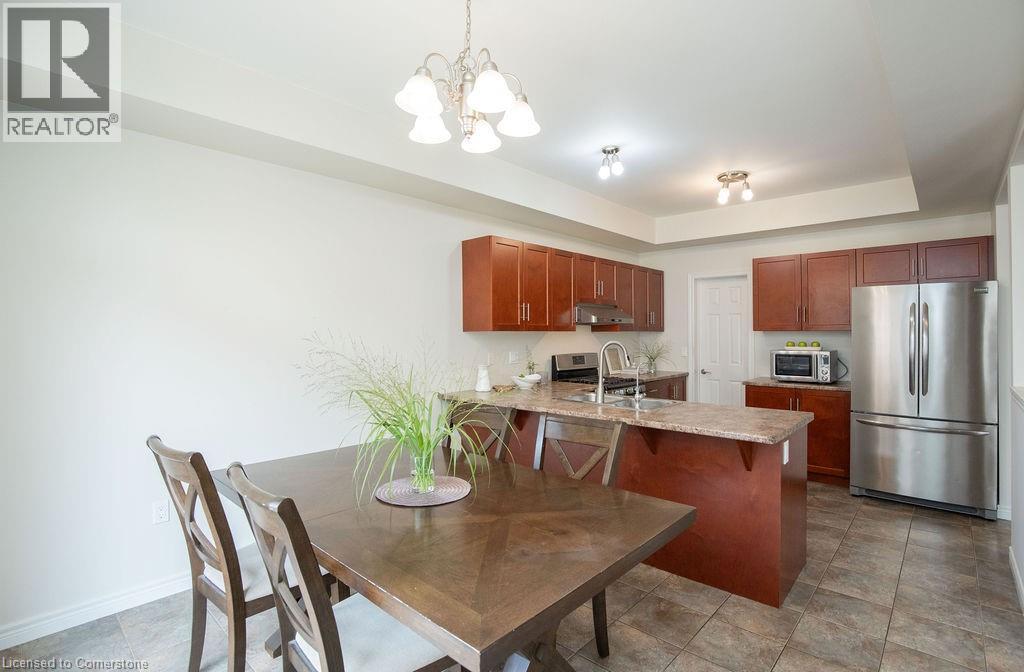 Photo 11 of 69 Winslow Way, Stoney Creek ON