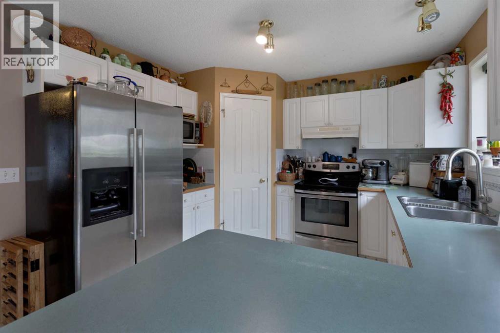 Photo 12 of 234 Quigley Drive, Cochrane AB