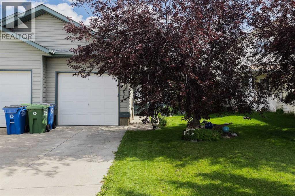 Photo 2 of 234 Quigley Drive, Cochrane AB