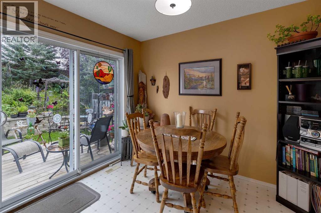 Photo 10 of 234 Quigley Drive, Cochrane AB