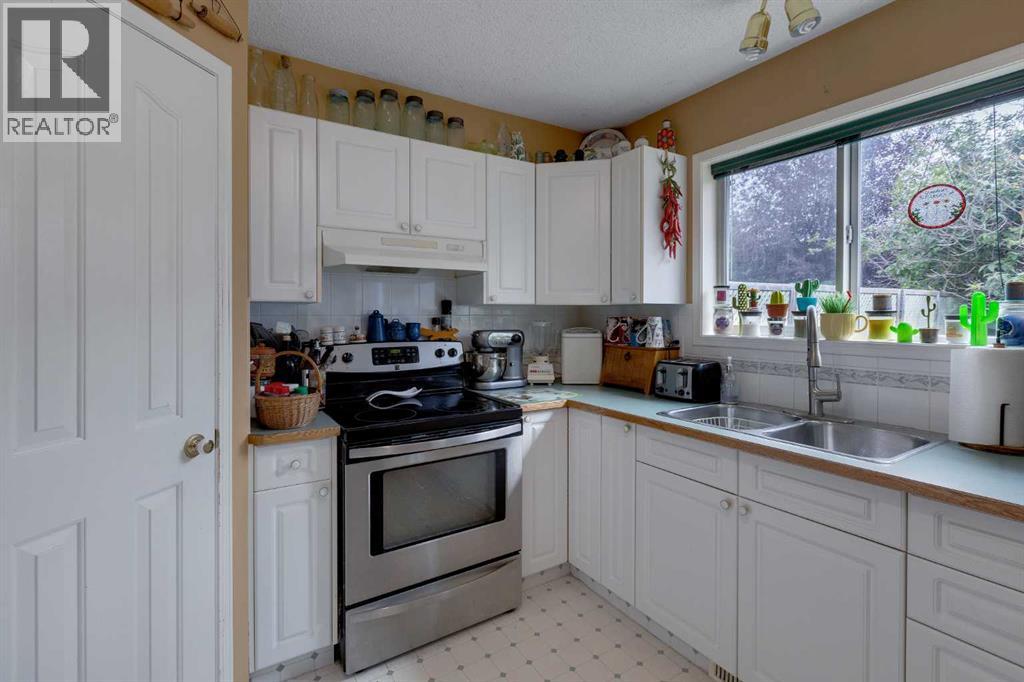 Photo 14 of 234 Quigley Drive, Cochrane AB