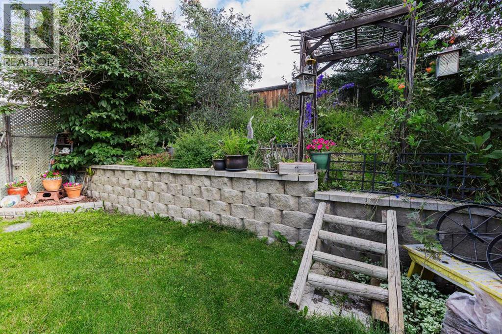 Photo 33 of 234 Quigley Drive, Cochrane AB