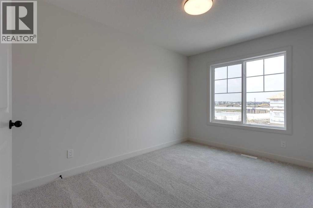 Photo 28 of 21 Bayview Mews Sw, Airdrie AB