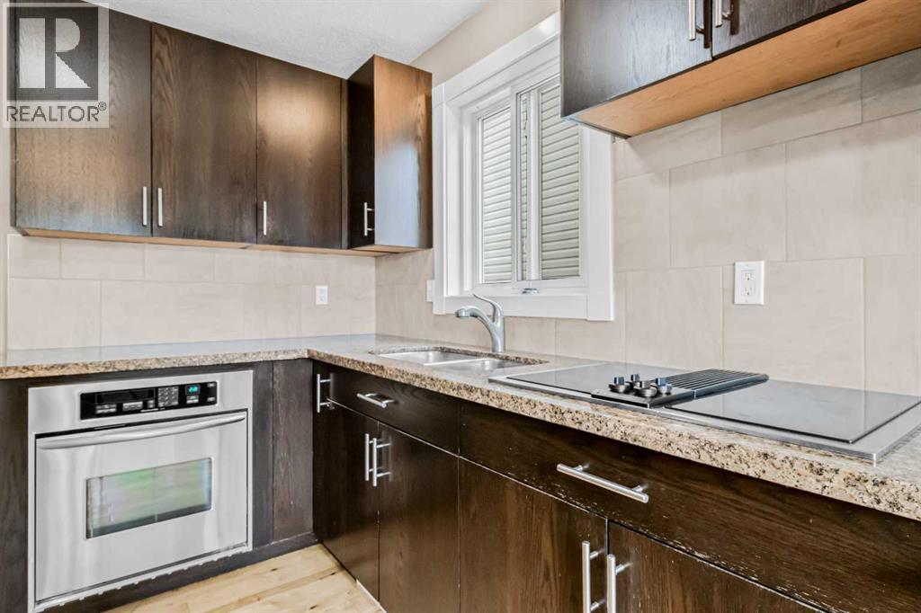 Single Family House Bi-level for Sale in   Street SW Shawnessy Calgary 