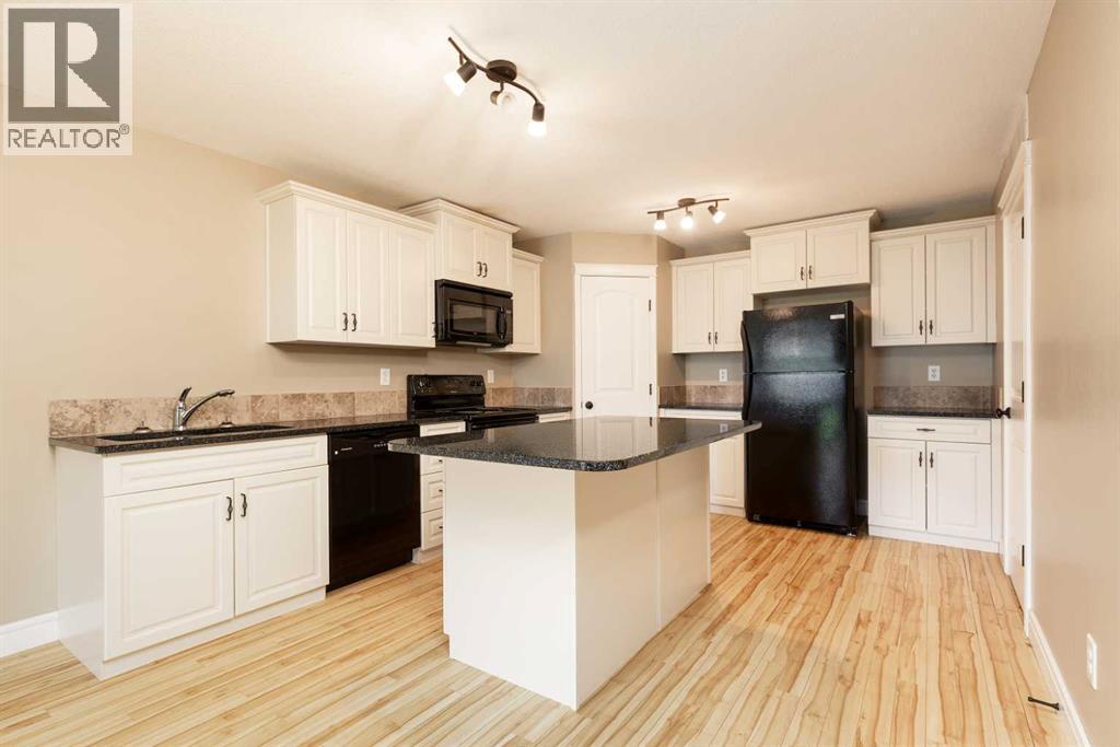 Single Family House for Sale in   Mt Sundance Manor W Sunridge Lethbridge 