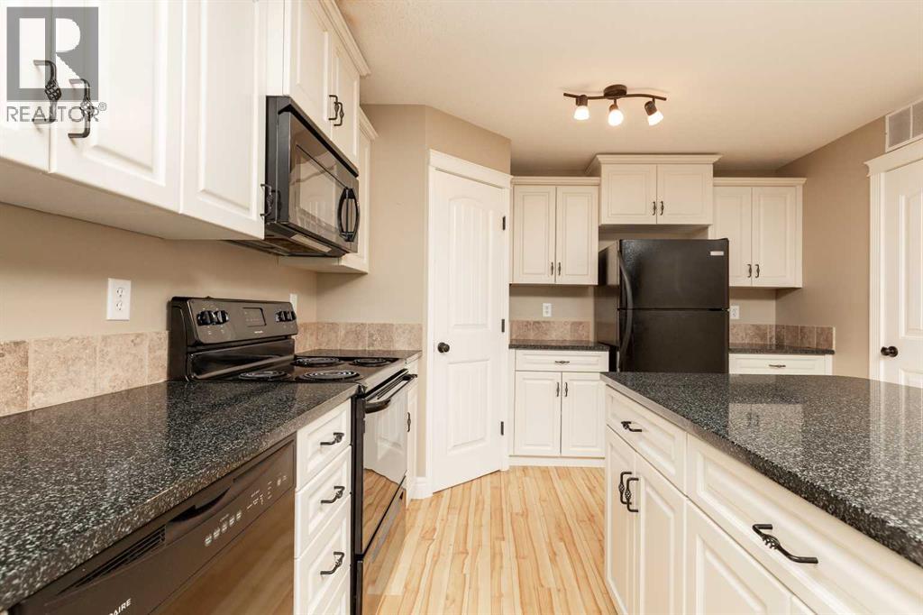 Single Family House for Sale in   Mt Sundance Manor W Sunridge Lethbridge 
