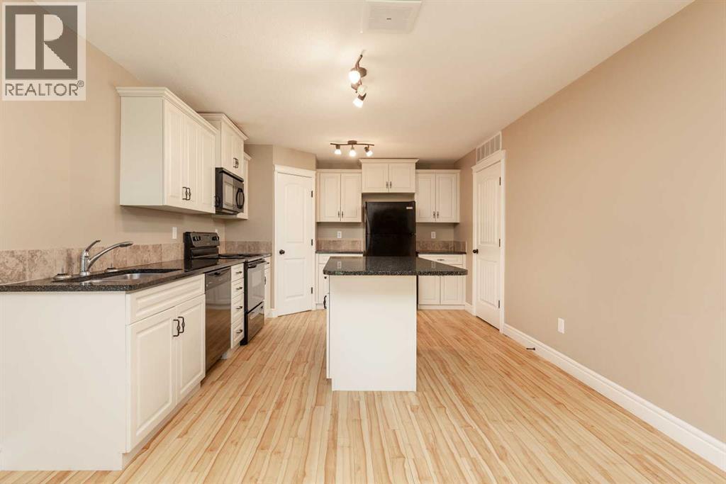 Single Family House for Sale in   Mt Sundance Manor W Sunridge Lethbridge 