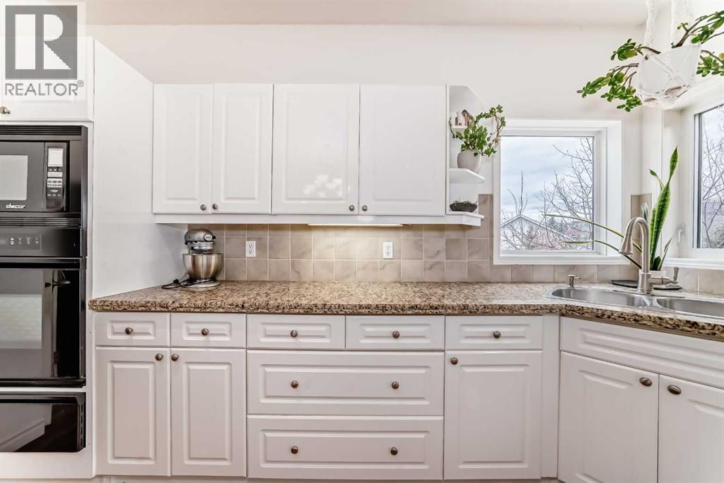 Single Family House for Sale in  Sierra Madre Court SW Signal Hill Calgary 