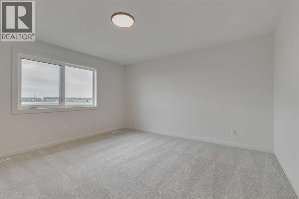 Photo 18 of 260 Dawson Wharf Crescent, Chestermere AB