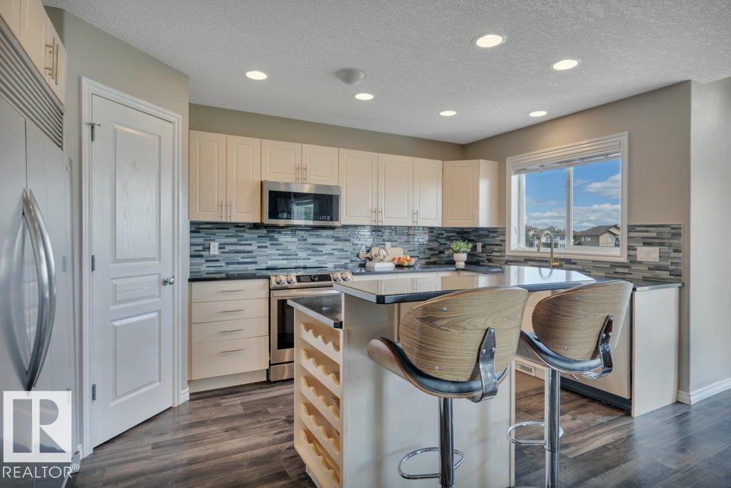 Photo 65 of 53 Douglas Cr, Leduc AB