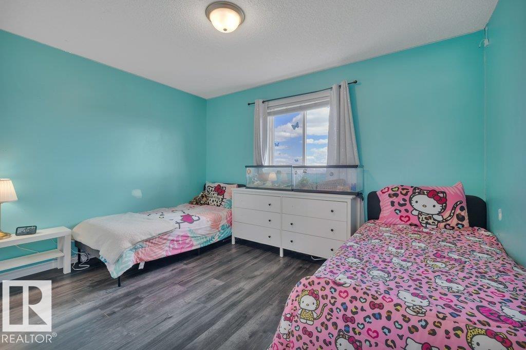 Photo 11 of 53 Douglas Cr, Leduc AB
