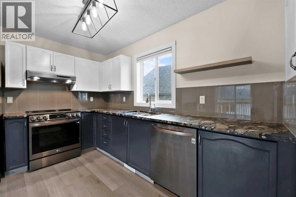 Single Family House Bi-level for Sale in  Laguna Way NE Monterey Park Calgary 