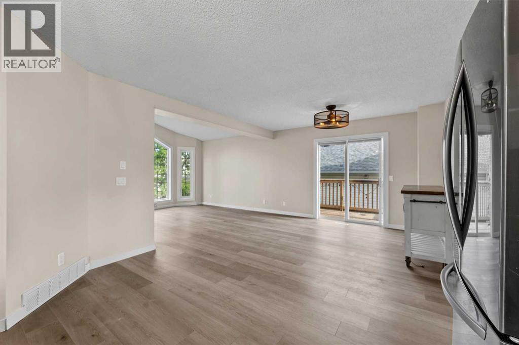 Single Family House Bi-level for Sale in  Laguna Way NE Monterey Park Calgary 