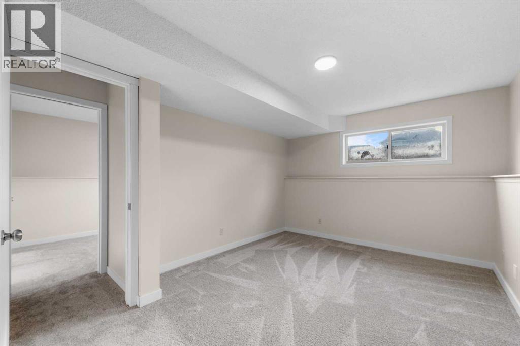 Single Family House Bi-level for Sale in  Laguna Way NE Monterey Park Calgary 