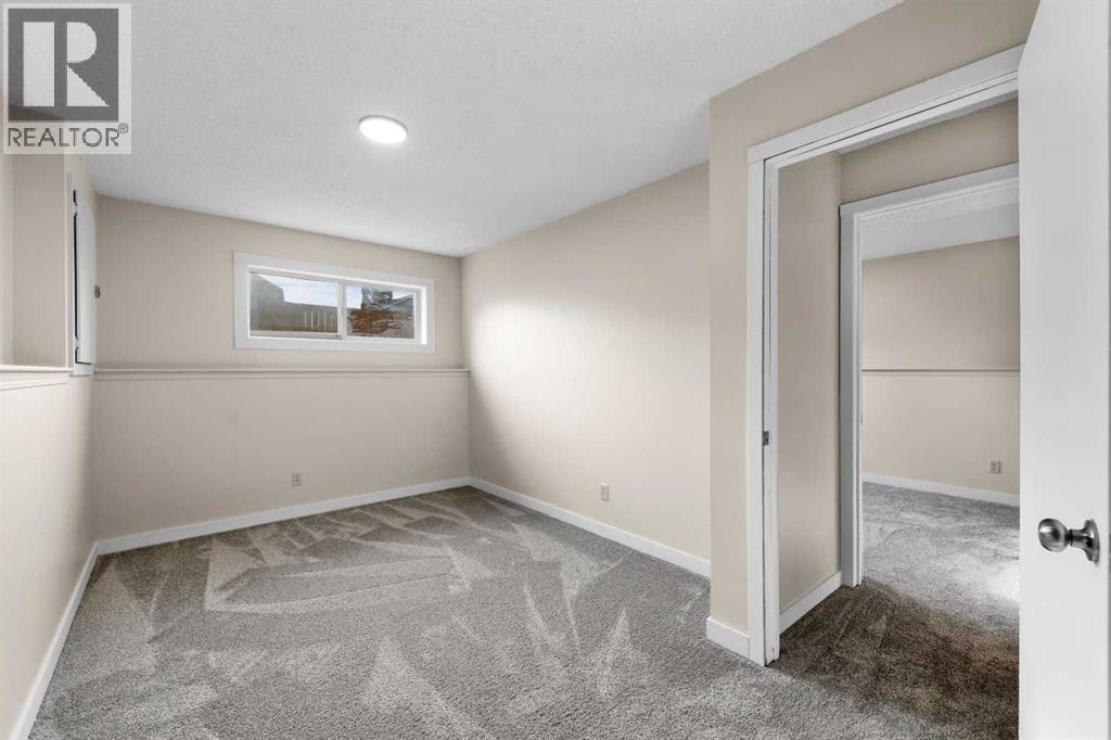 Single Family House Bi-level for Sale in  Laguna Way NE Monterey Park Calgary 