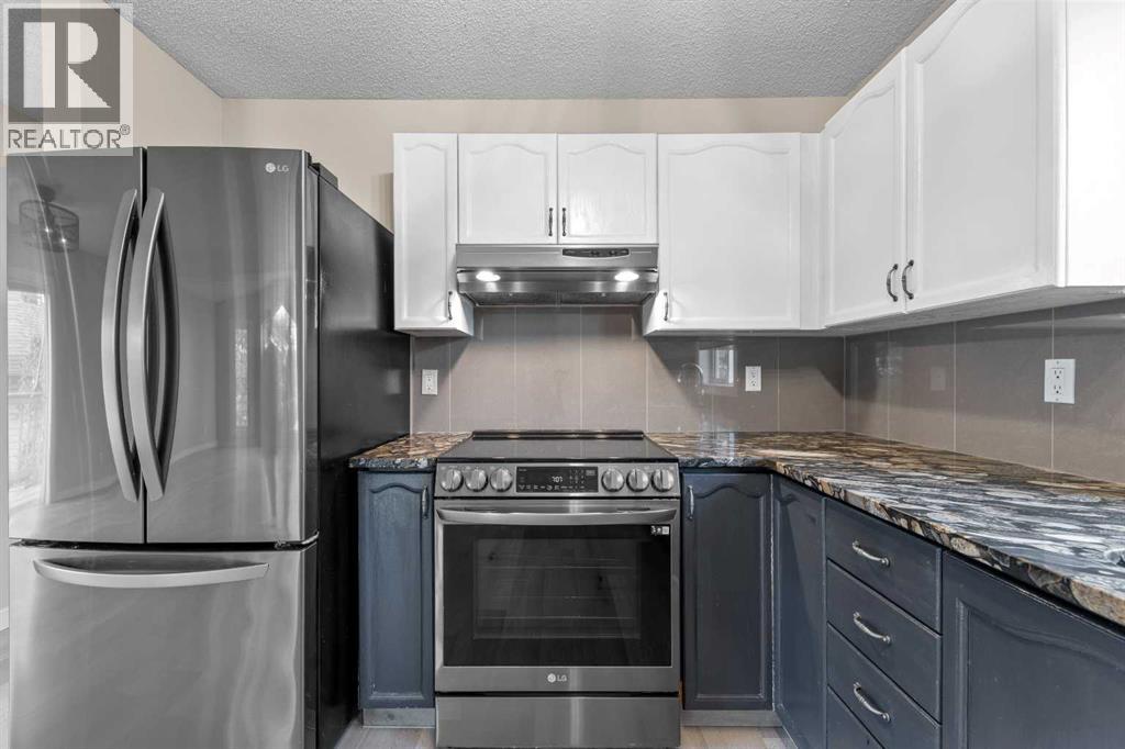 Single Family House Bi-level for Sale in  Laguna Way NE Monterey Park Calgary 