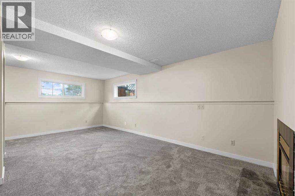 Single Family House Bi-level for Sale in  Laguna Way NE Monterey Park Calgary 