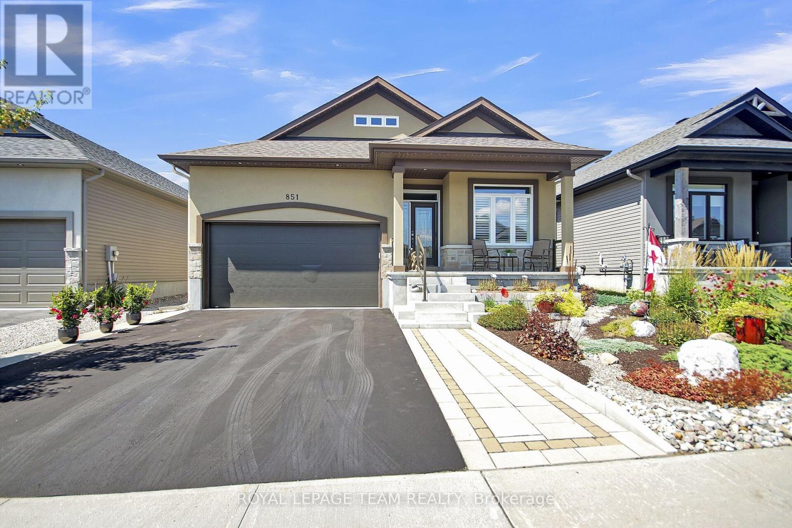 Detached custom bungalow in Riverfront Estates