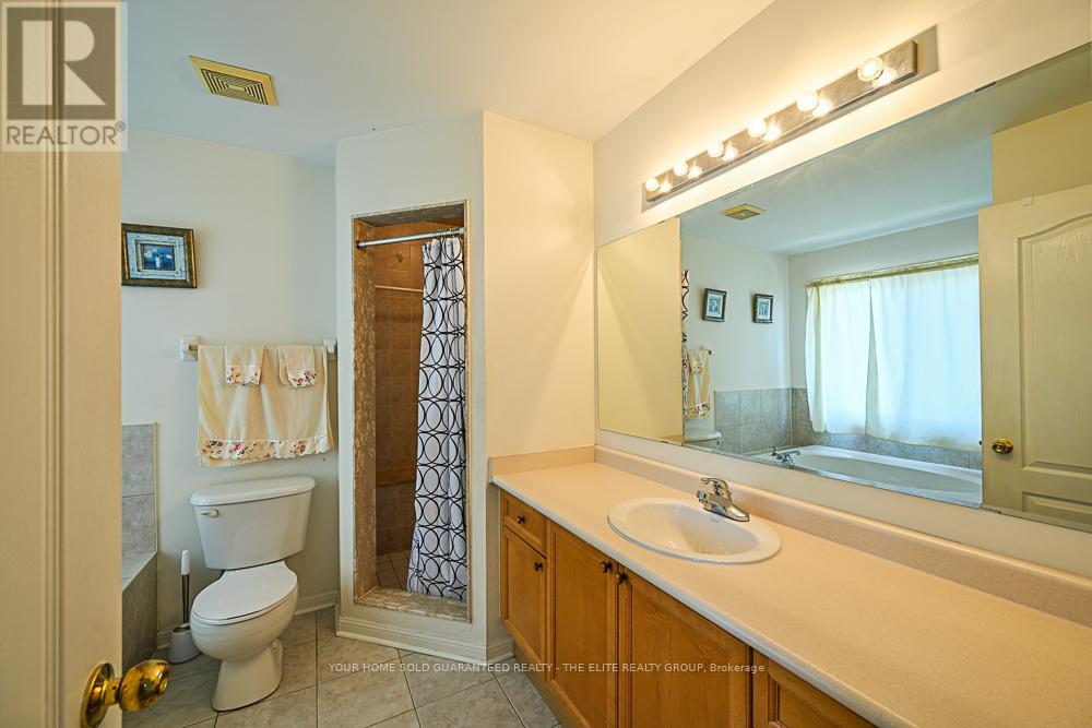 Photo 8 of 73 Botavia Downs Drive, Brampton ON