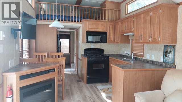 Photo 15 of 3 Timber Crescent, Rural Mountain View County AB