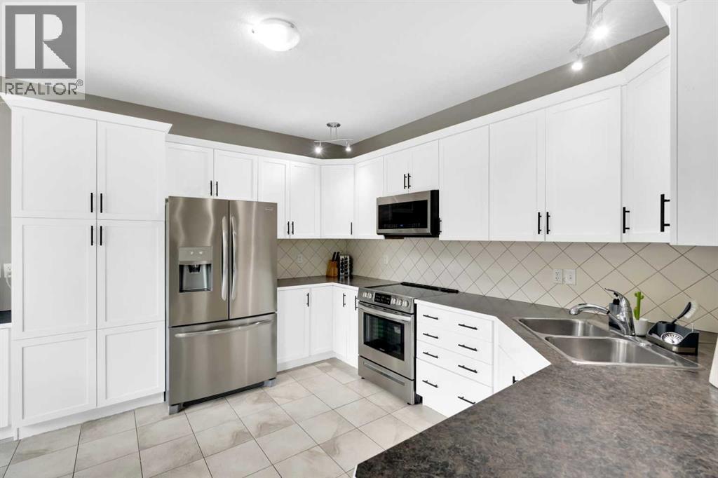 Photo 13 of 2020 Windsong Drive Sw, Airdrie AB
