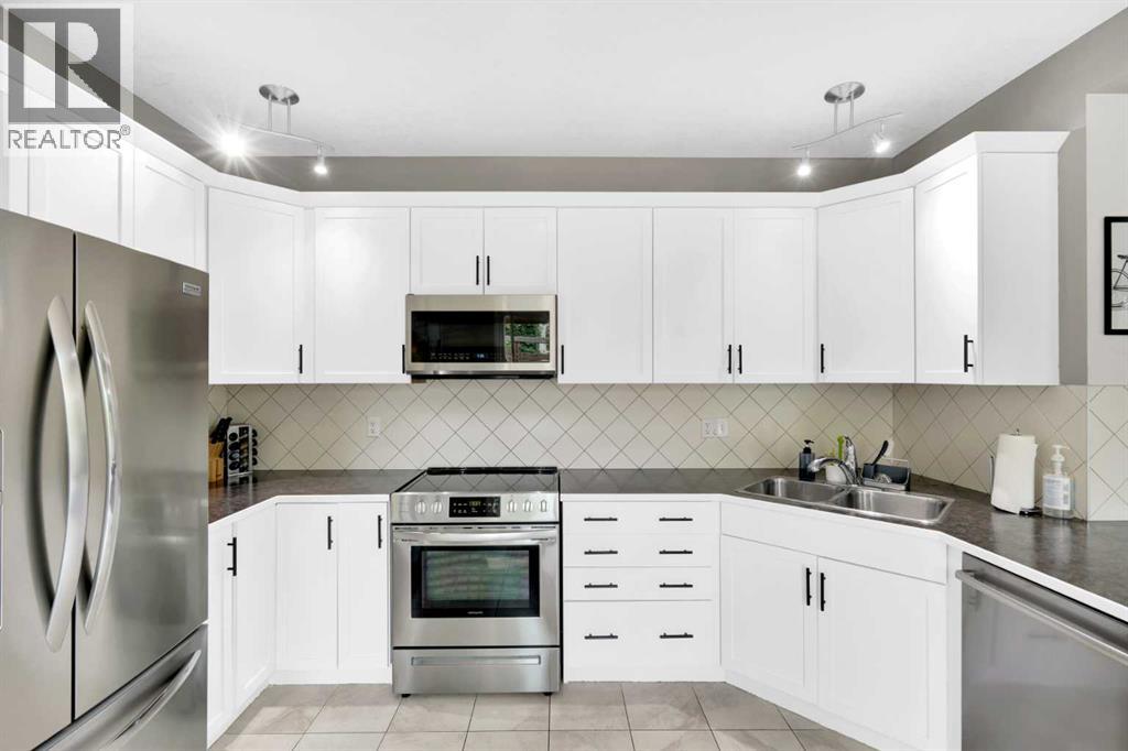 Photo 12 of 2020 Windsong Drive Sw, Airdrie AB