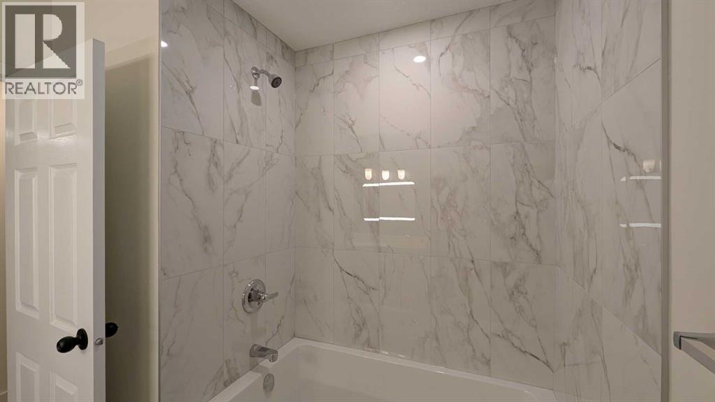 Photo 13 of 103 Haverhill Road Sw, Calgary AB
