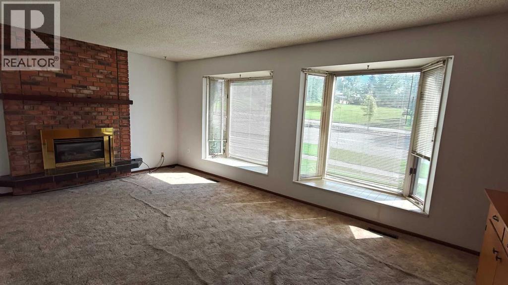 Photo 7 of 4315 Charleswood Drive Nw, Calgary AB