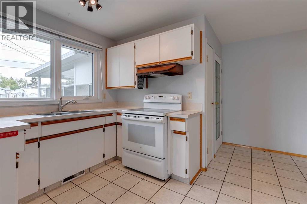Single Family House Bungalow for Sale in  Pensacola Close SE Penbrooke Meadows Calgary 