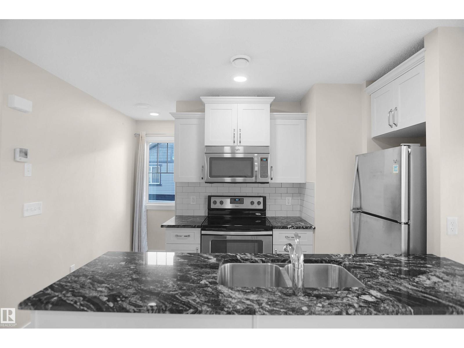 Photo 8 of 4 12815 Cumberland Rd Nw, Edmonton AB