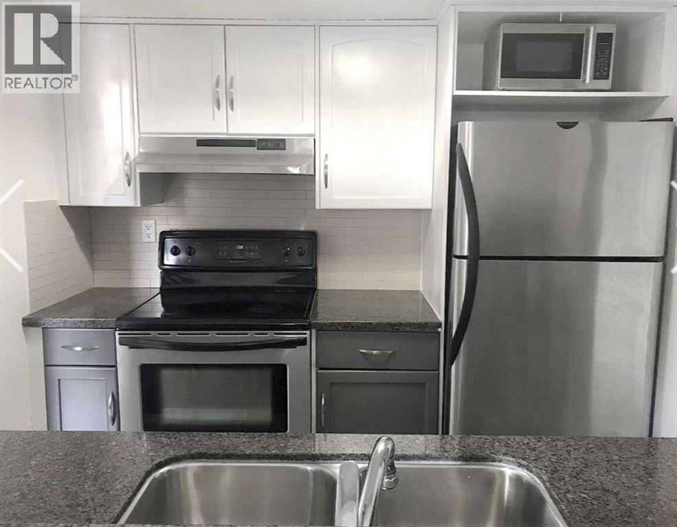 Photo 12 of 106 1123 13 Avenue Sw, Calgary AB
