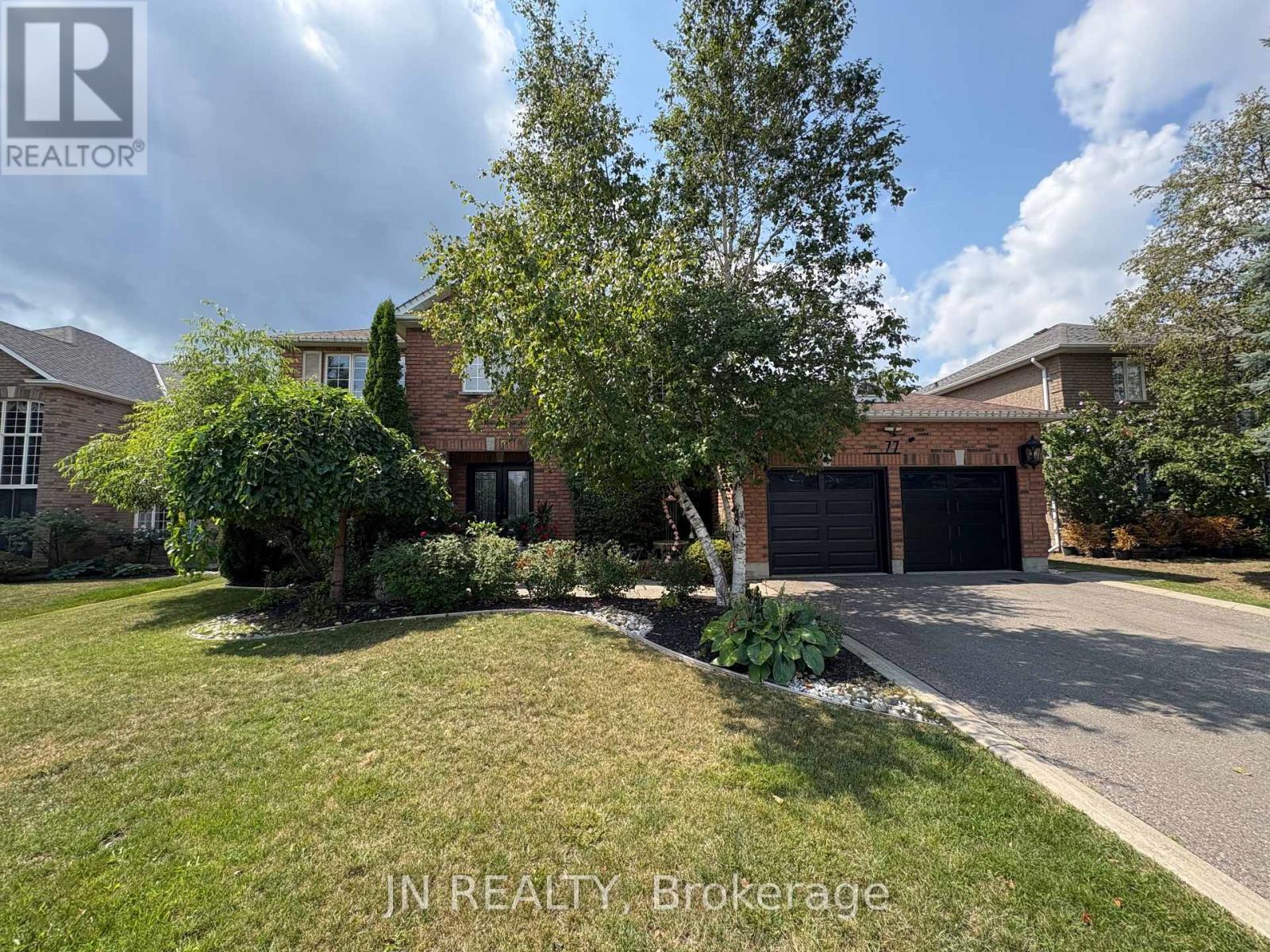 Photo 1 of 77 Colonel Bertram Road, Brampton ON