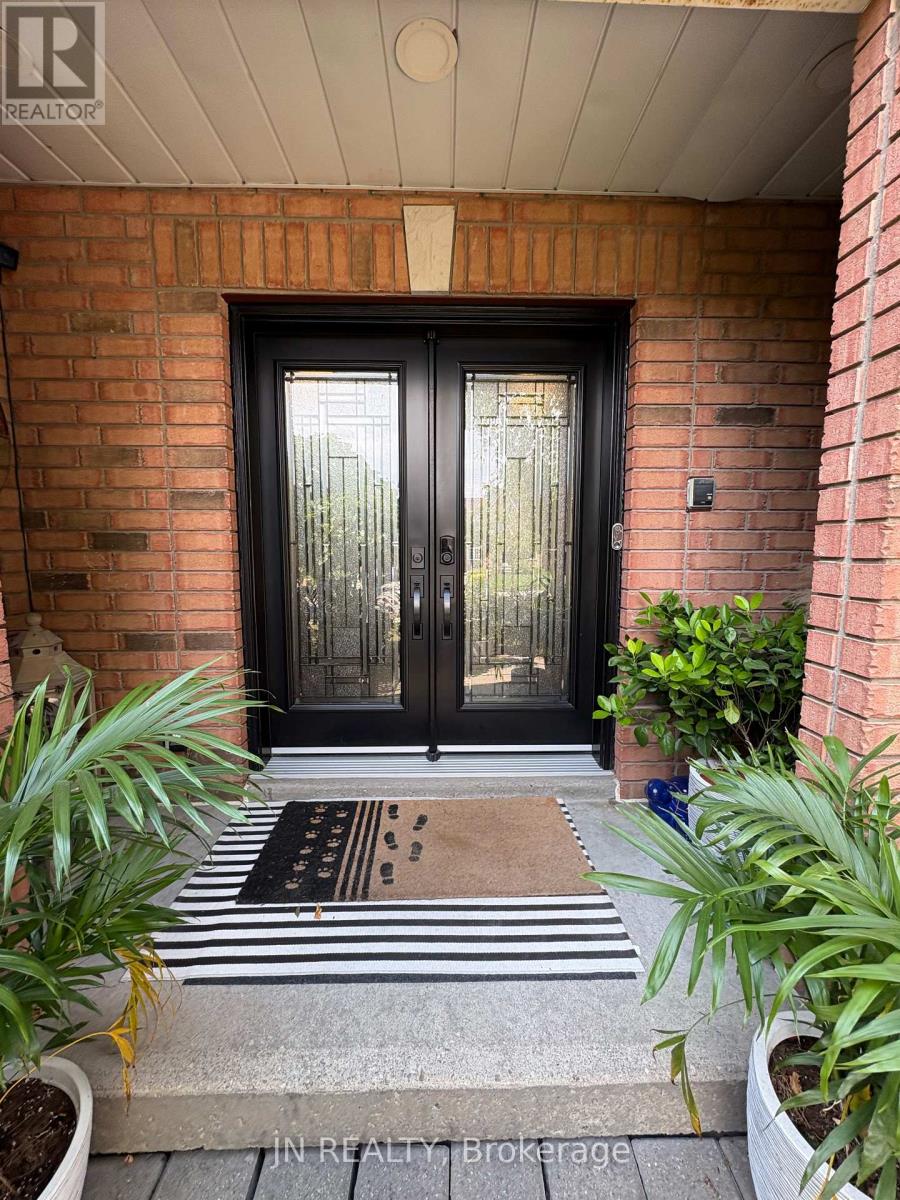 Photo 2 of 77 Colonel Bertram Road, Brampton ON