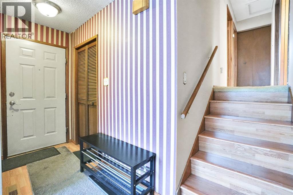 Single Family House 4 Level for Sale in  Coach Hill Road SW Coach Hill Calgary 