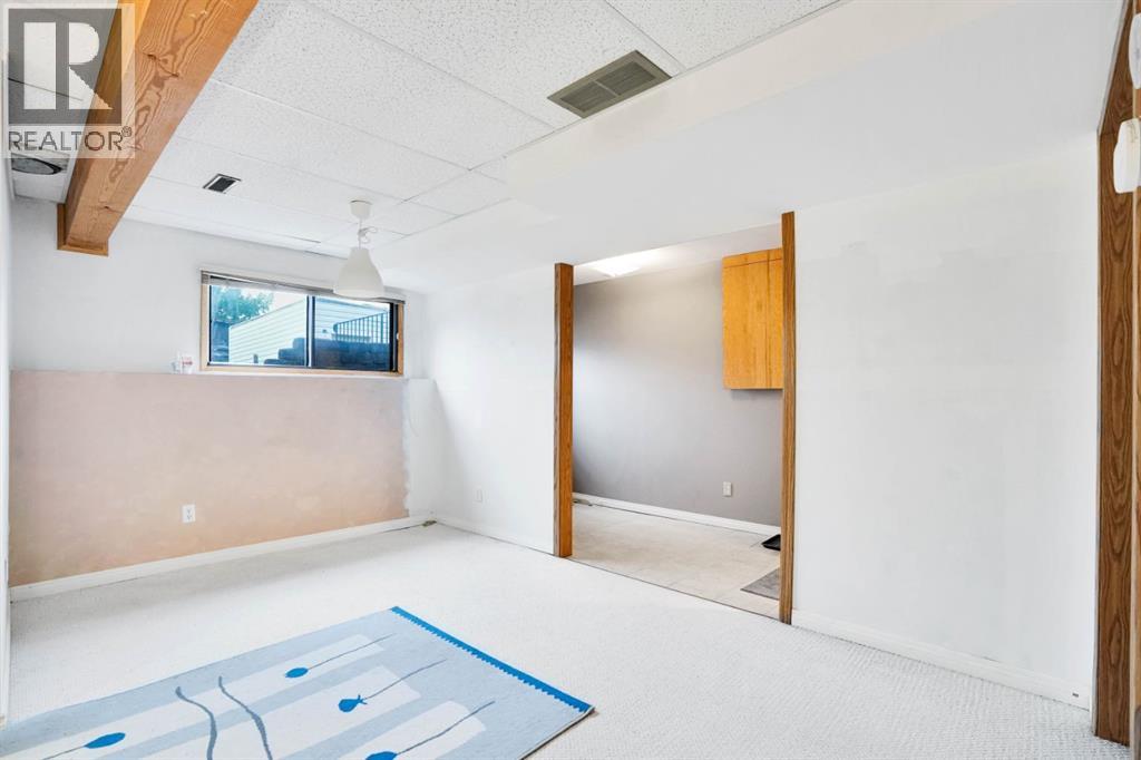 Single Family House 4 Level for Sale in  Coach Hill Road SW Coach Hill Calgary 