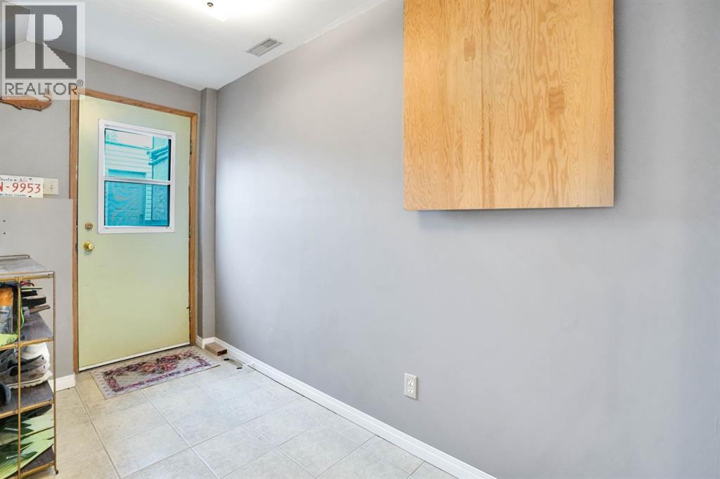 Single Family House 4 Level for Sale in  Coach Hill Road SW Coach Hill Calgary 