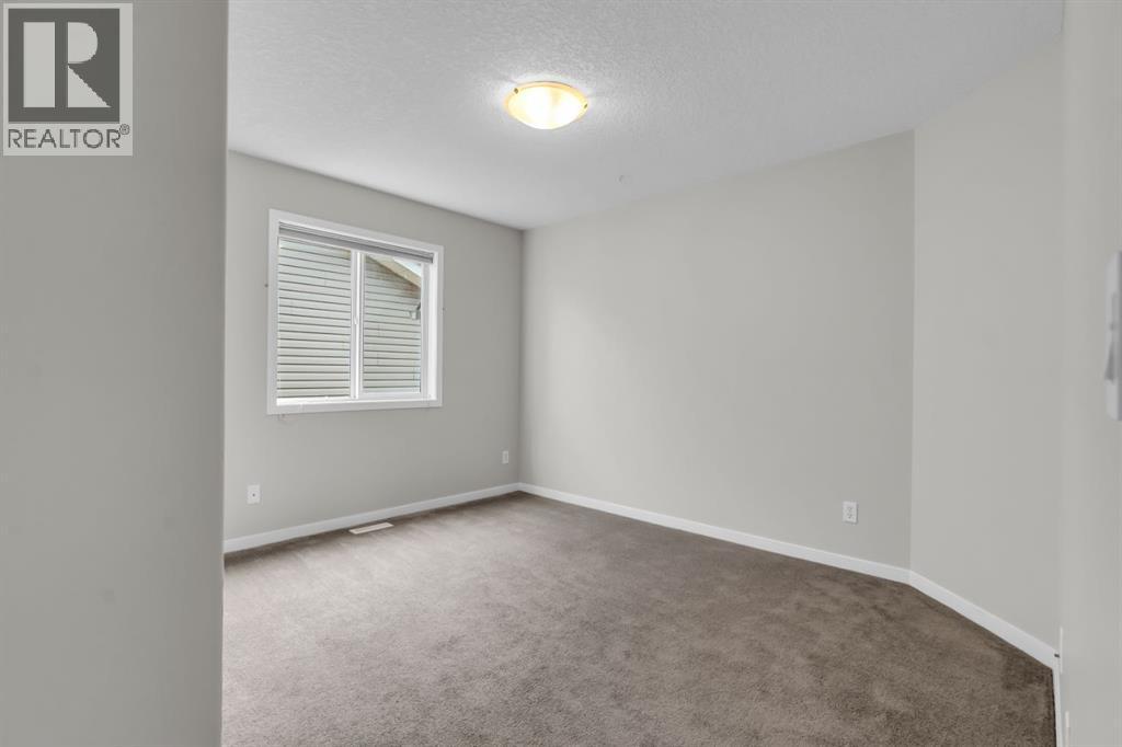 Photo 28 of 16 Cougartown Close Sw, Calgary AB
