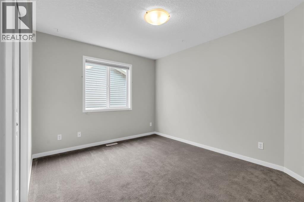 Photo 25 of 16 Cougartown Close Sw, Calgary AB
