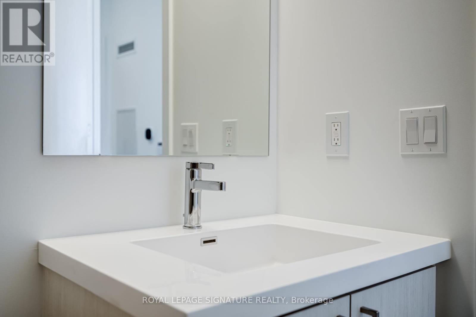 Photo 2 of 322 60 George Butchart Drive, Toronto ON