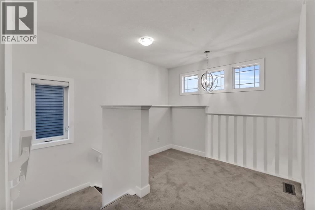 Photo 19 of 649 Reynolds Crescent Sw, Airdrie AB