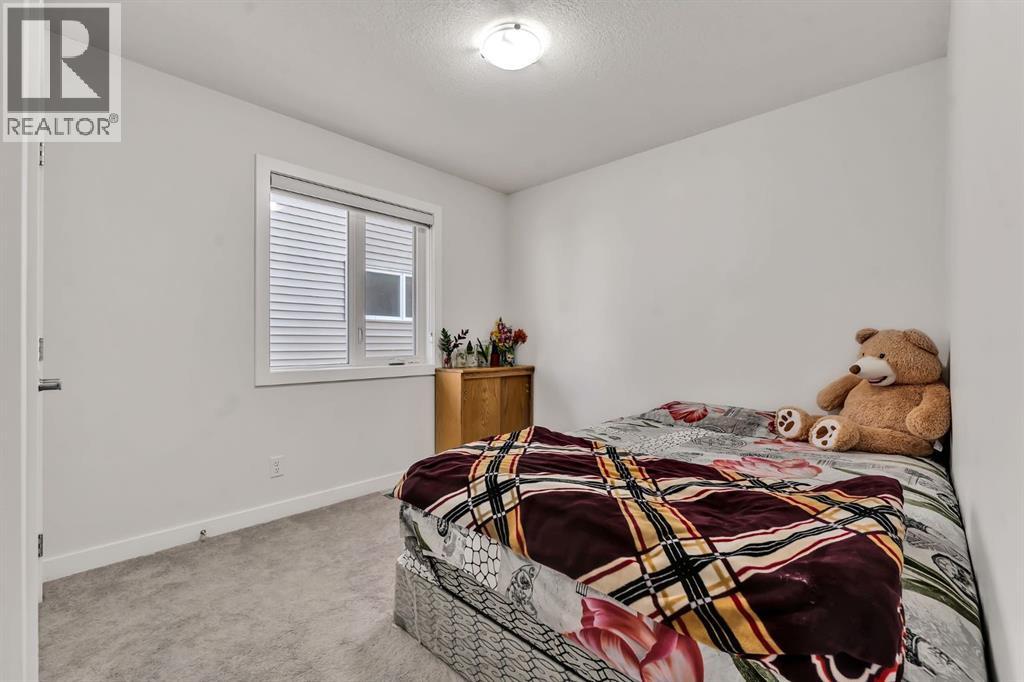 Photo 24 of 649 Reynolds Crescent Sw, Airdrie AB