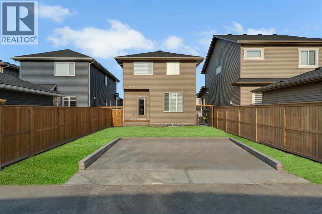 Photo 30 of 649 Reynolds Crescent Sw, Airdrie AB
